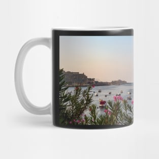 Pink Nerium oleander flowers against Malta's Bay Mug